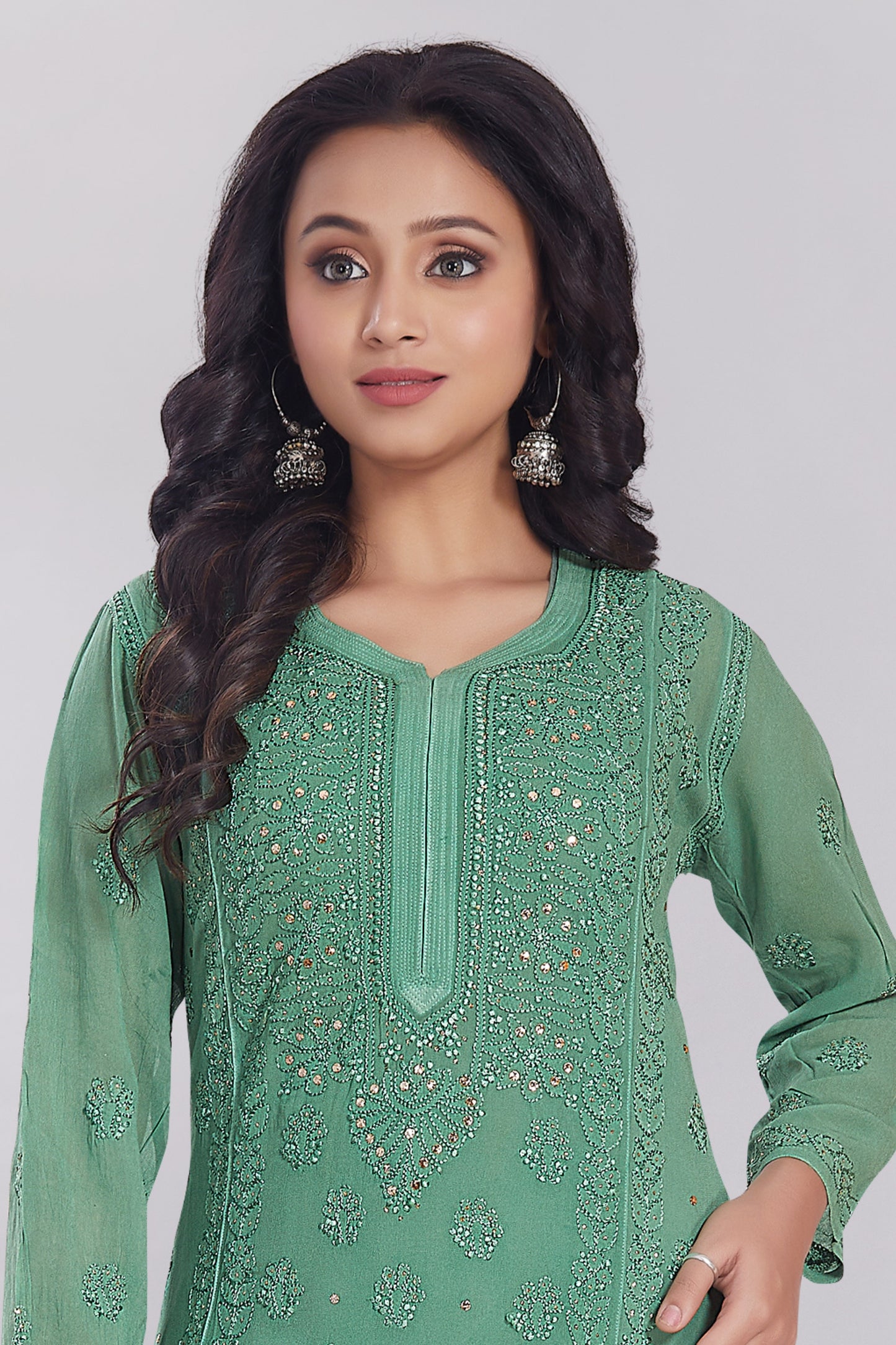 Naaz Jade Green Georgette Mukaish Kurti.