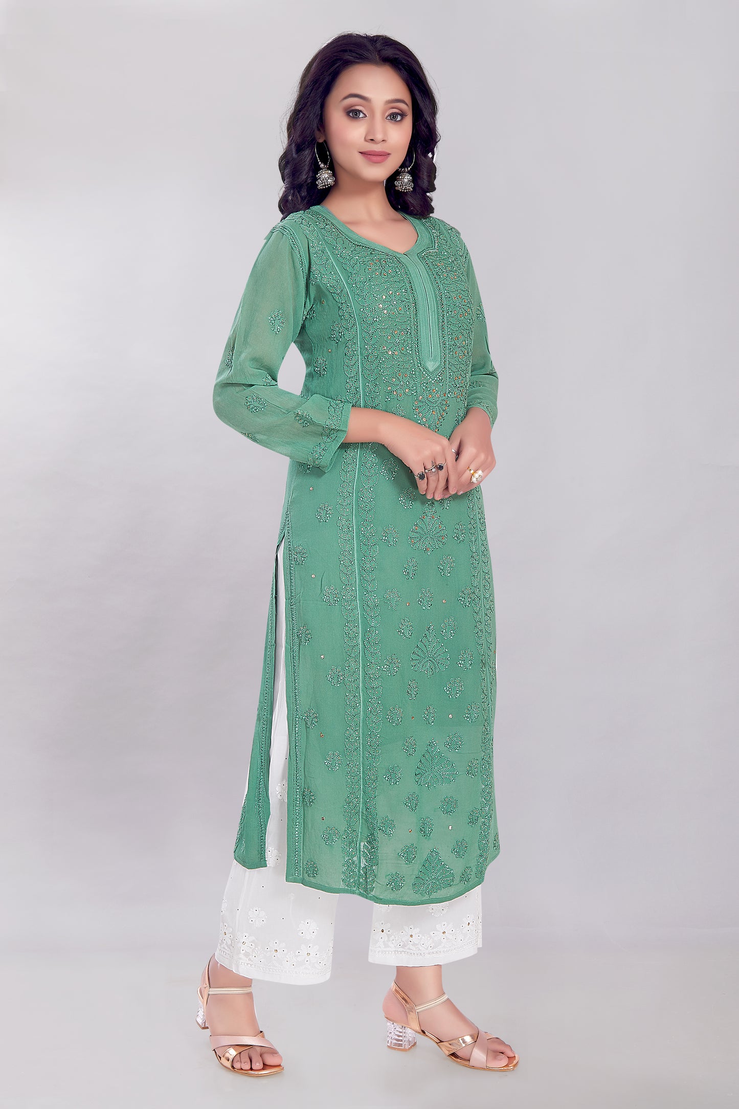 Naaz Jade Green Georgette Mukaish Kurti.