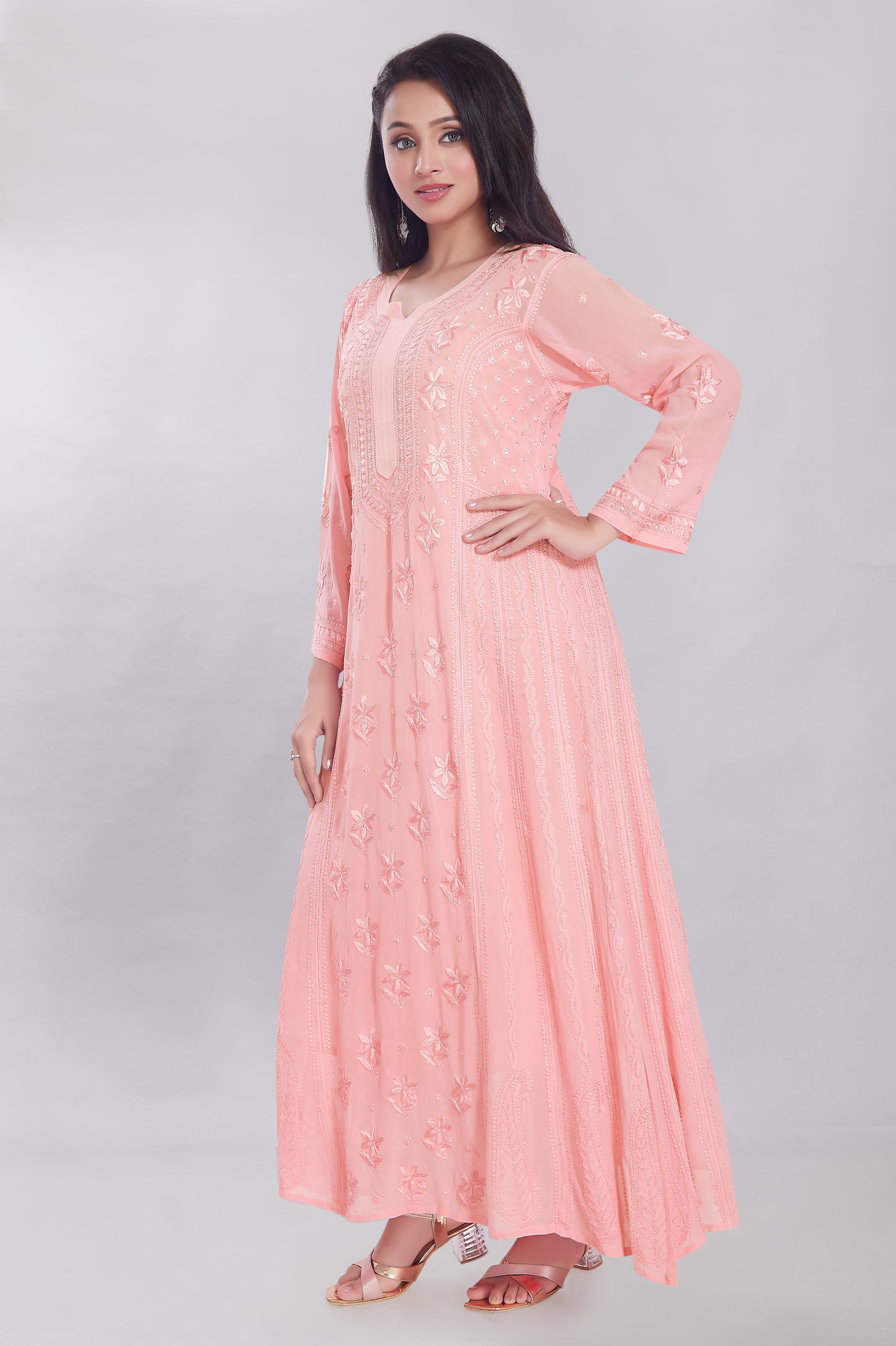 Georgette full length Anarkali in Pastel Peach with Heavy Jaaldaar Chikankari.