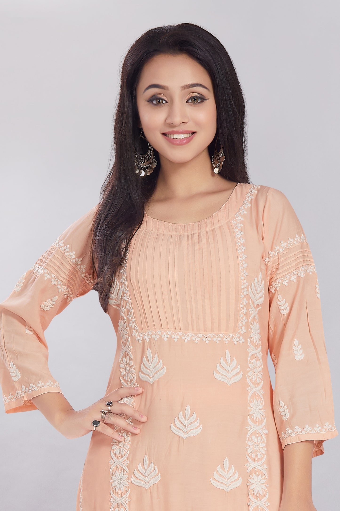 Inaya Salmon Peach Muzlin Kurti Set.